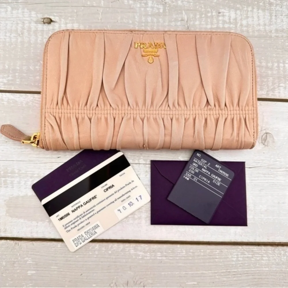 Authentic Prada Nappa Gaufre Zip Around Wallet. Previously owned. Color: Nude.